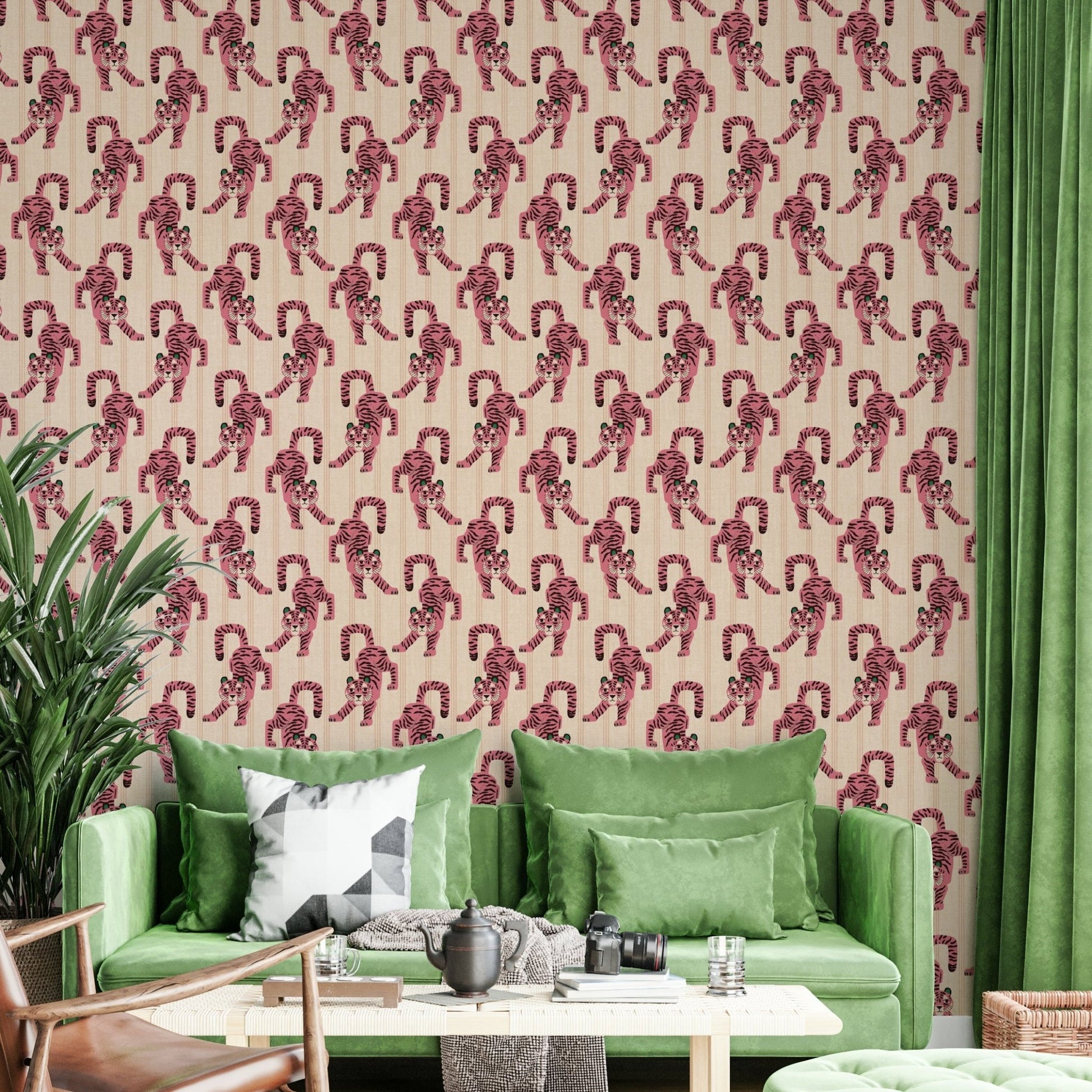 Close-up of tiger motifs on pink wallpaper

