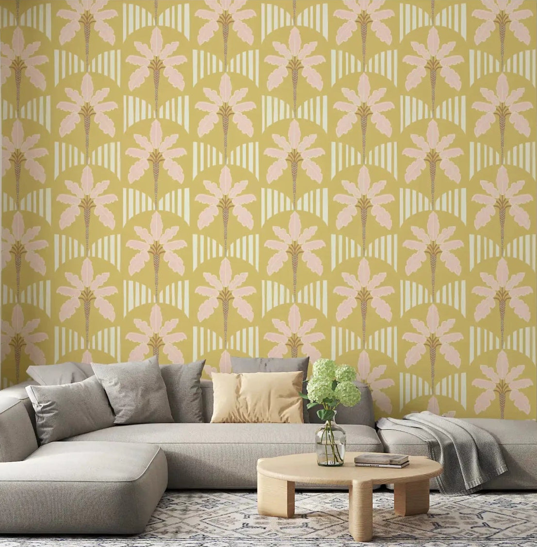 Living room anchored by a feature in Pink Palm Retro Oasis wallpaper