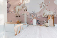 Whimsical pink Pegasus wall mural for interiors
