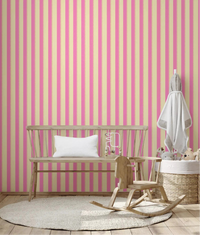 Pink Stripe Delight Wallpaper behind a crib in a soft nursery with wooden toys, GD8902