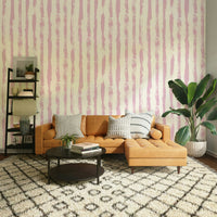 Wallpaper with a cheerful pink and white stripe design

