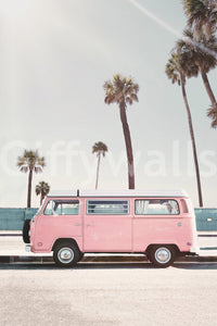 Cute pink van on sunny street

