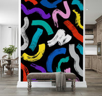 Modern Play with Joy design, a vibrant wall statement featuring bold, curvy paint swashes.
