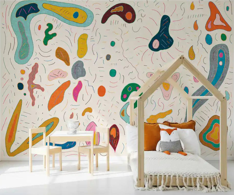 Inside the nursery, a playful abstract shapes wall mural adds soft colour and motion.GD9531