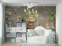 Two cute rabbits are nibbling on clover near some bushes.
