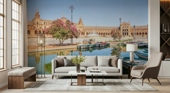 Plaza de España Charm Wall Mural gives this lounge a bright courtyard and canal backdrop, GD7977