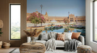 Plaza de España Charm Wall Mural brings reflective water and warm stone detail to this cozy corner