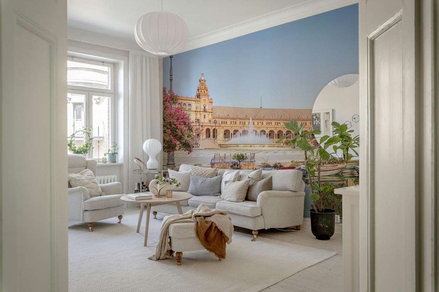 A soft living room feels more graceful with Plaza de España Charm Wall Mural in view