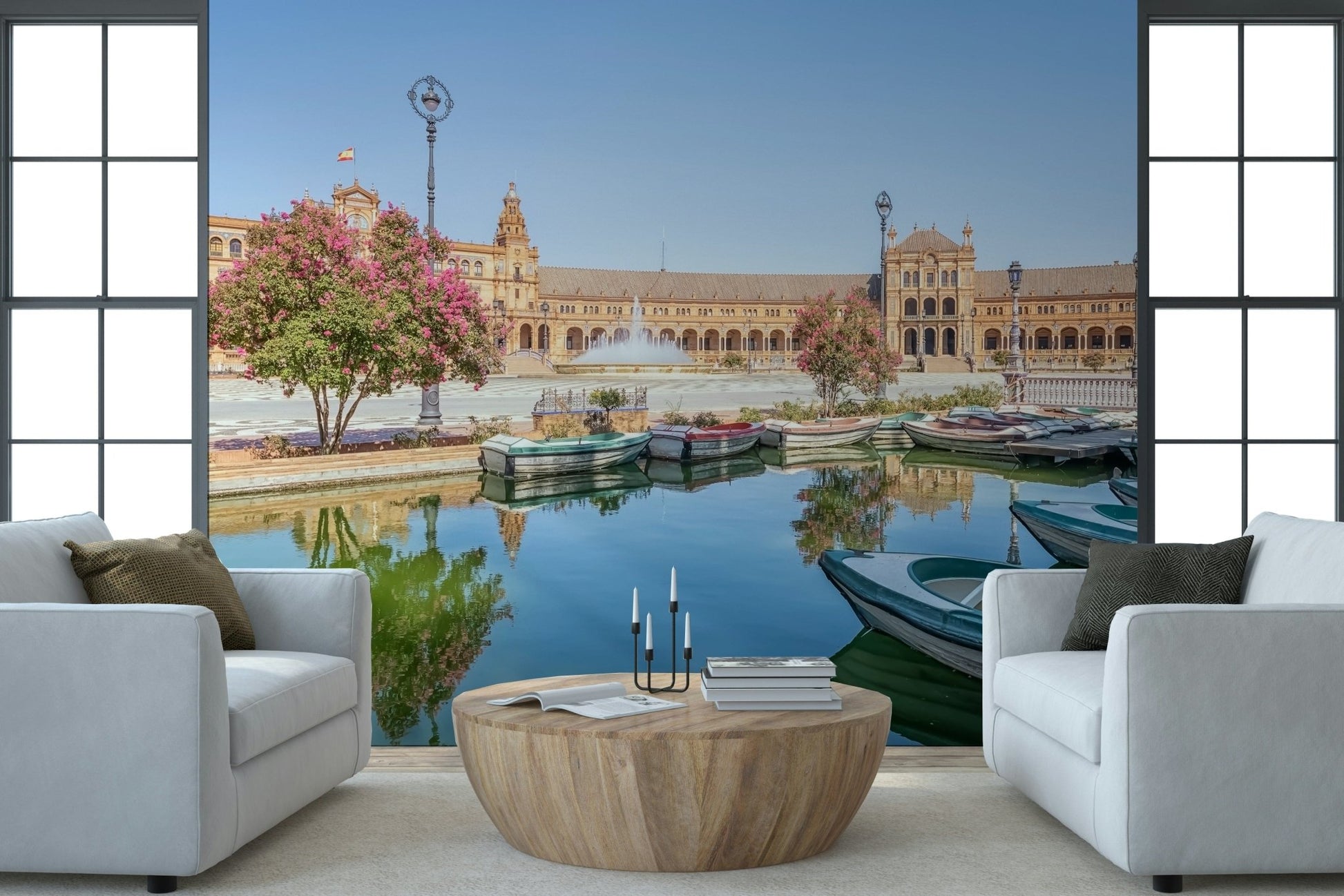 Framed by large windows, Plaza de España Charm Wall Mural opens this room beautifully
