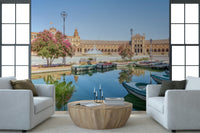 Framed by large windows, Plaza de España Charm Wall Mural opens this room beautifully
