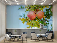 An artistic pomegranate tree mural on minimalist wallpaper.

