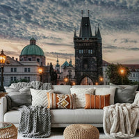 Prague's Charm Wall Mural gives this cozy living area a timeless bridge-side backdrop, GD7961