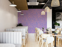 A close-up of a puffy, cloud-like flower pattern on wallpaper.

