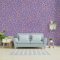 The whimsical flower design flowing across a room's wall.

