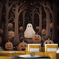 One ghost peeks over the top of a pumpkin in the foreground.
