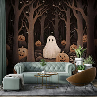 The ground is a dark color with several large, orange pumpkins.
