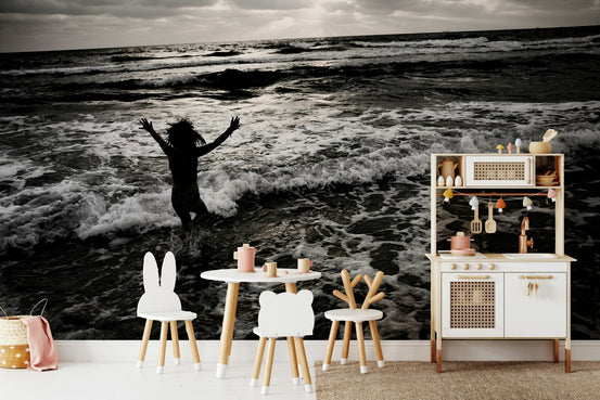 Pure Joy Wall Mural with a jubilant figure in crashing surf GD4972
