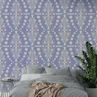 An angled shot of a wall with intricate wallpaper

