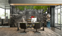 A high-angle view of the wall mural in a large space.

