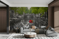 The wallpaper is used as a feature wall in a bedroom.

