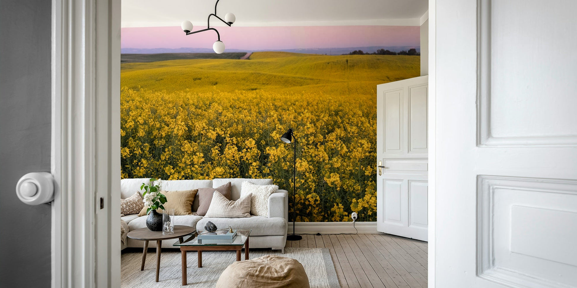 Features an expansive field of bright yellow mustard blooms.
