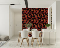 Full view of a stylish dining room with Red Autumn maple leaves on black Wallpaper.