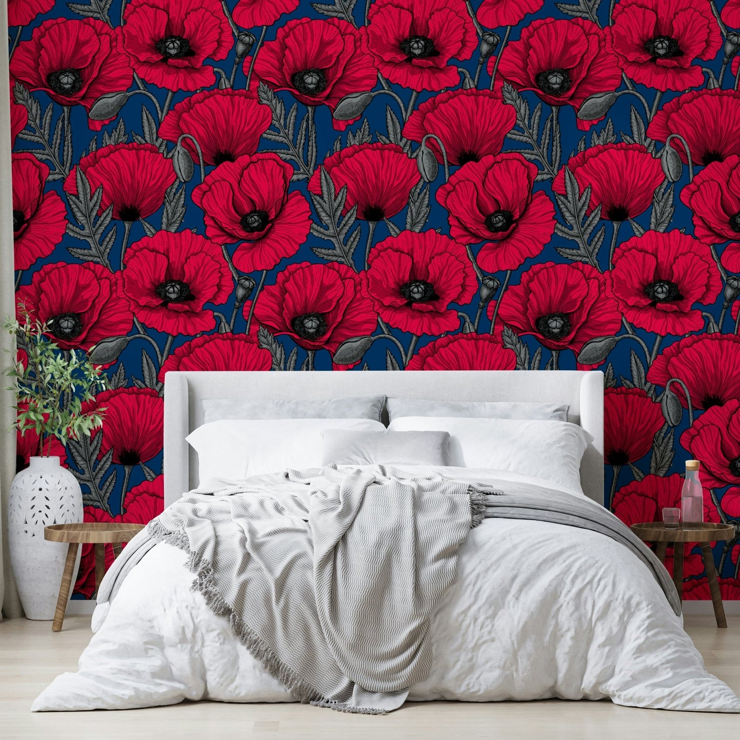 Vibrant red poppies against dark blue wallpaper

