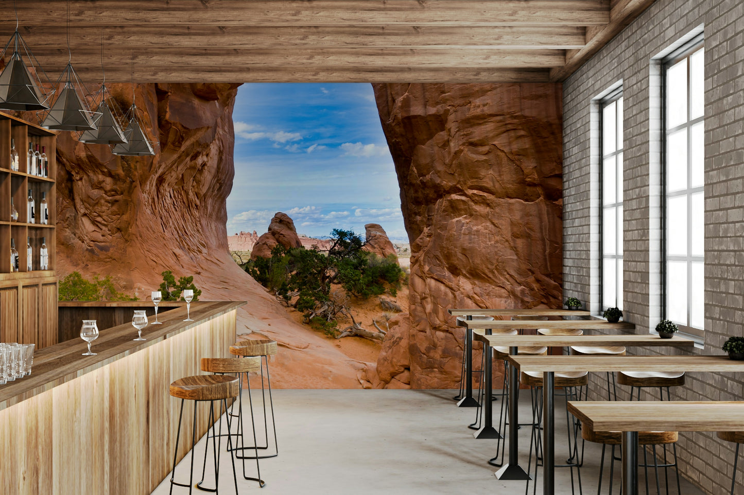 Rugged rock wall mural with blue sky
