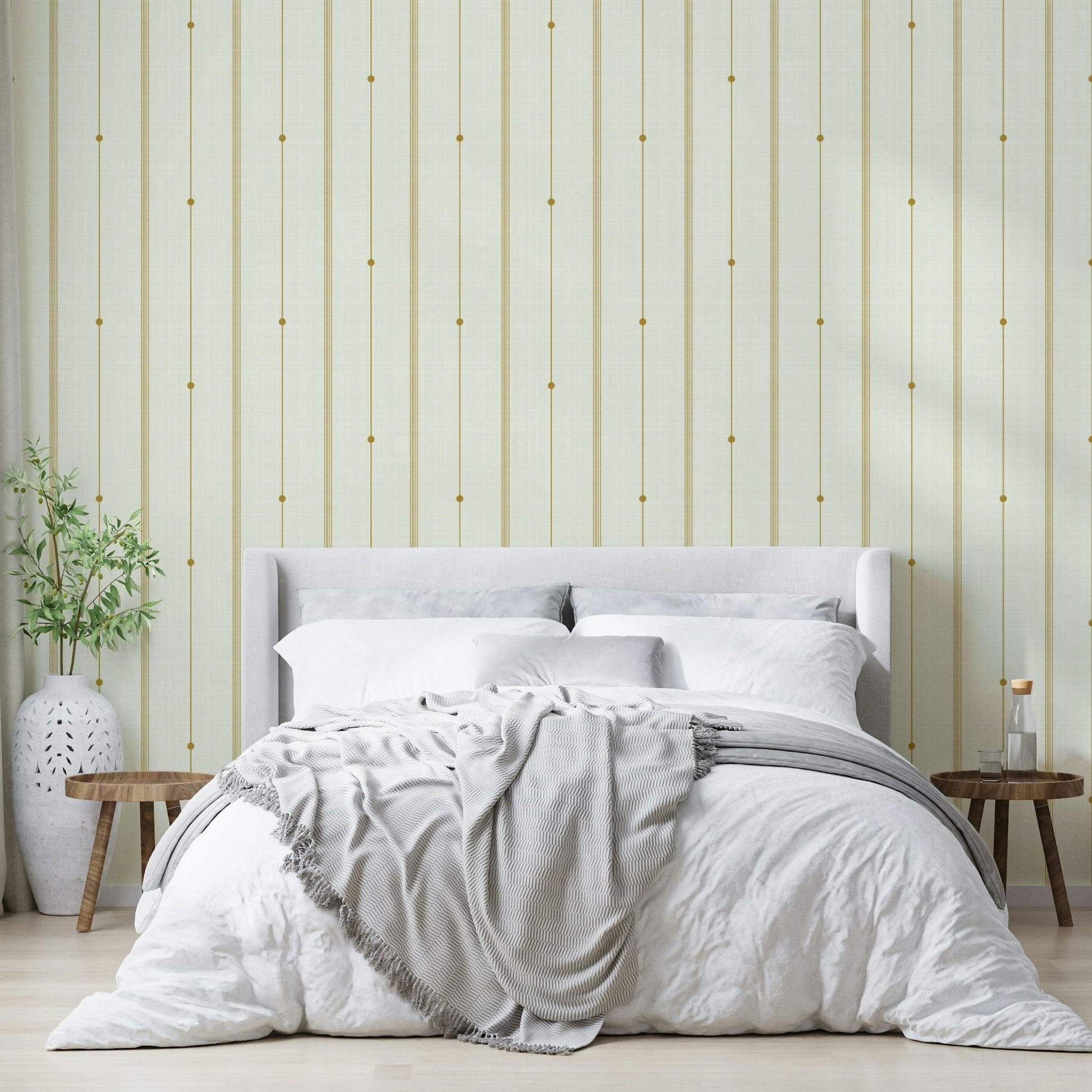 Striped wallpaper in a soft mustard and cream combination.