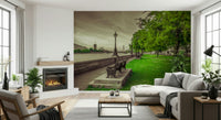 Wall mural of tranquil riverside scene, majestic London skyline backdrop.