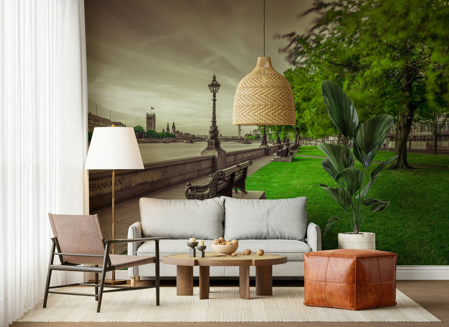 Riverside green space mural, cloudy sky above the Thames waterway.