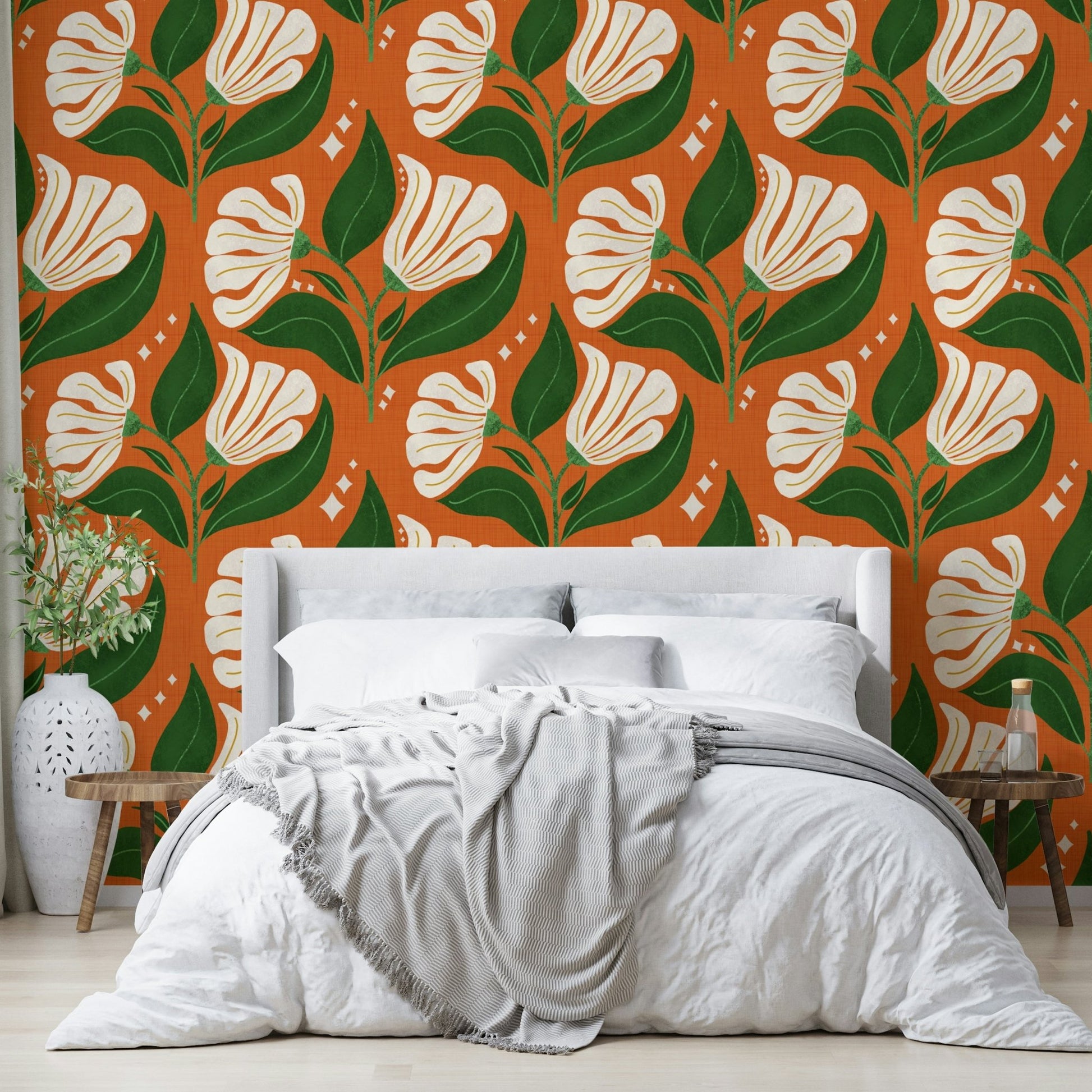 The color palette includes cream florals set against an avocado orange background.
