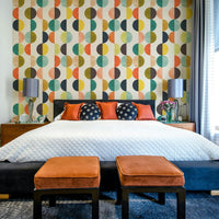 A high-resolution wall mural with a retro geometric pattern of circles.

