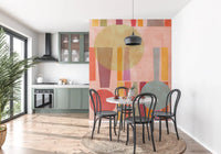Dining and kitchen area Retro Geo Play wall mural in muted blush, terracotta, and blue tones
