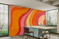 An angled shot of a wall with abstract, artistic wallpaper

