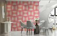 Groovy pink and peach circle pattern wall mural for funky decor.
