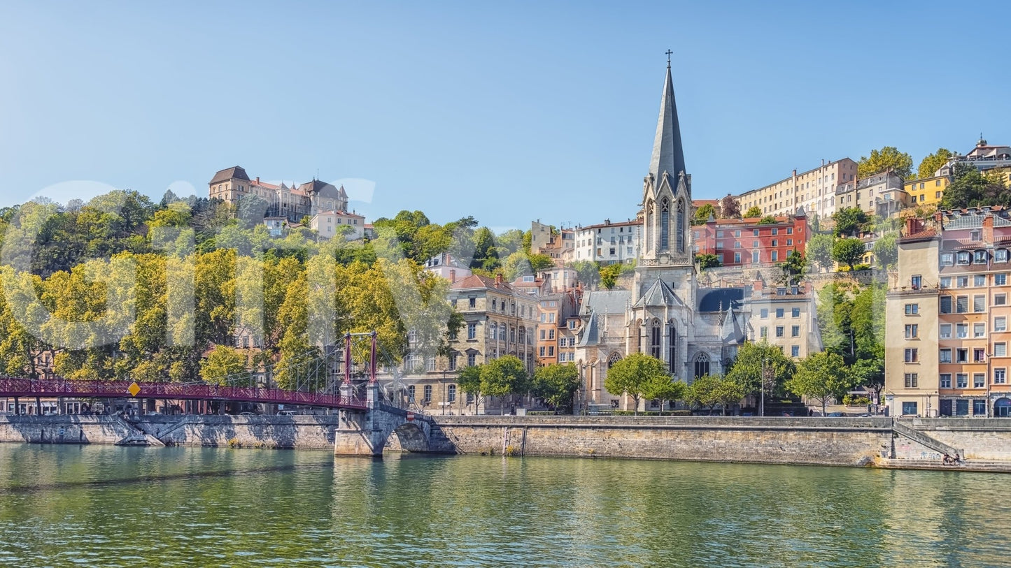 Riverside Charm: Lyon wall mural showcasing timeless stone masonry.