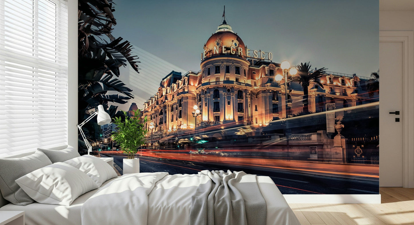 Azure Riviera Nights wallpaper showing glowing lights along the sea.