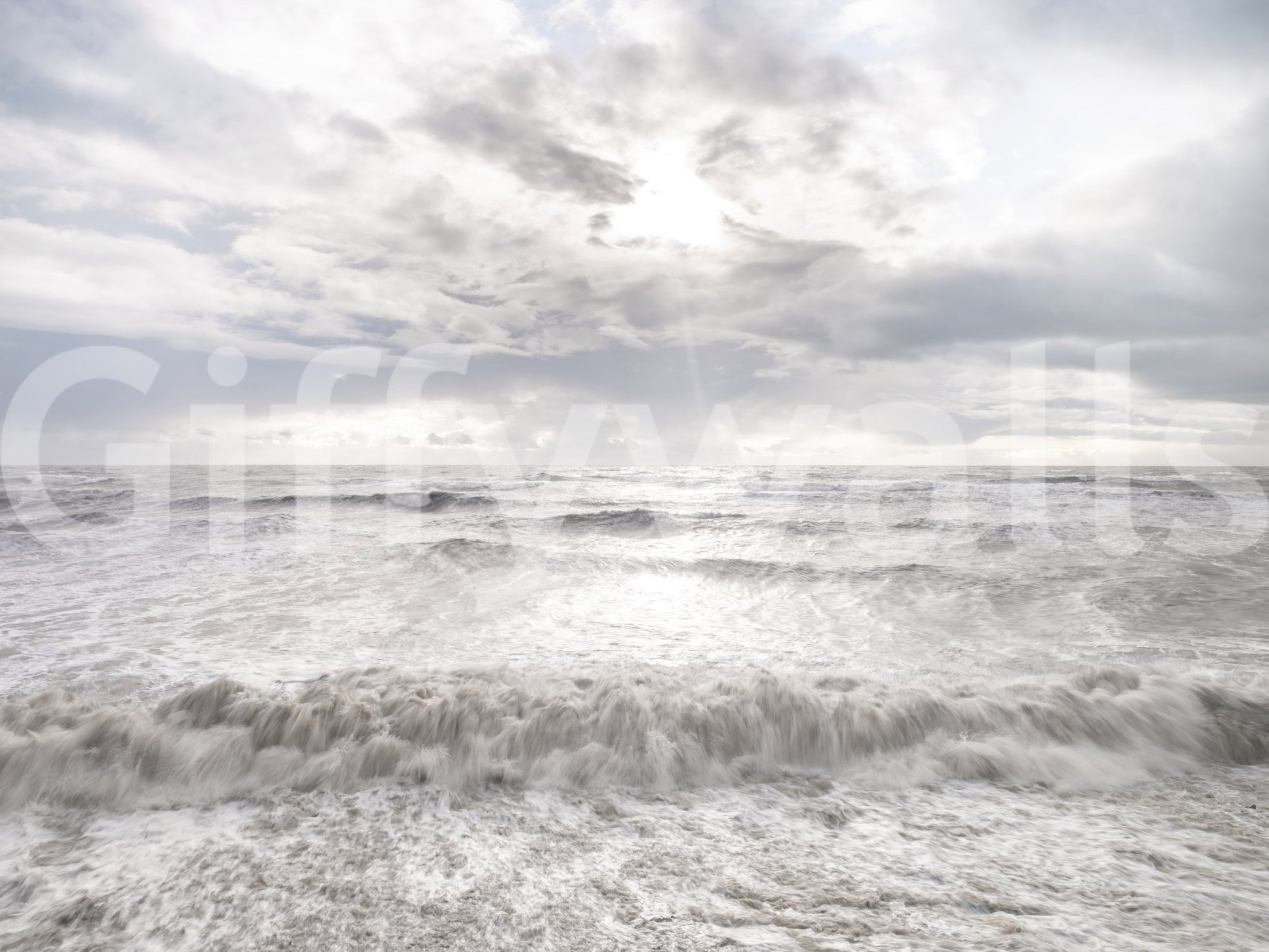 Wide ocean view in Rough Stormy Sea Wall Mural showing turbulent surf motion