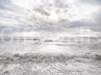 Wide ocean view in Rough Stormy Sea Wall Mural showing turbulent surf motion