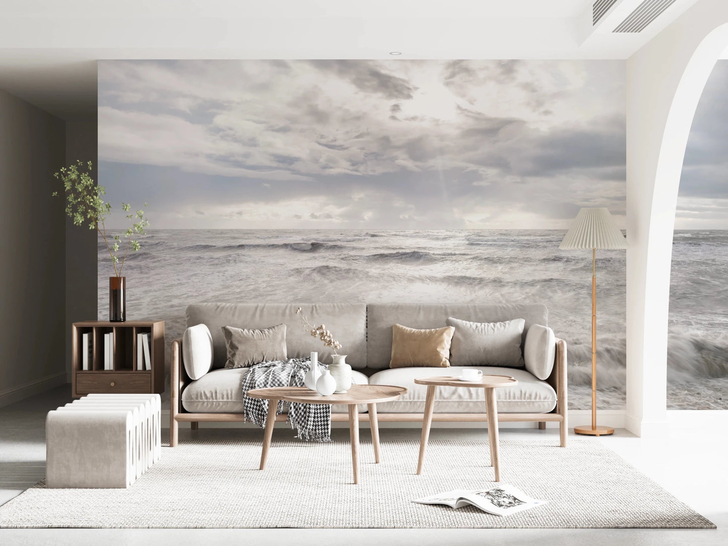 Minimal living room framed by Rough Stormy Sea Wall Mural in soft gray waves