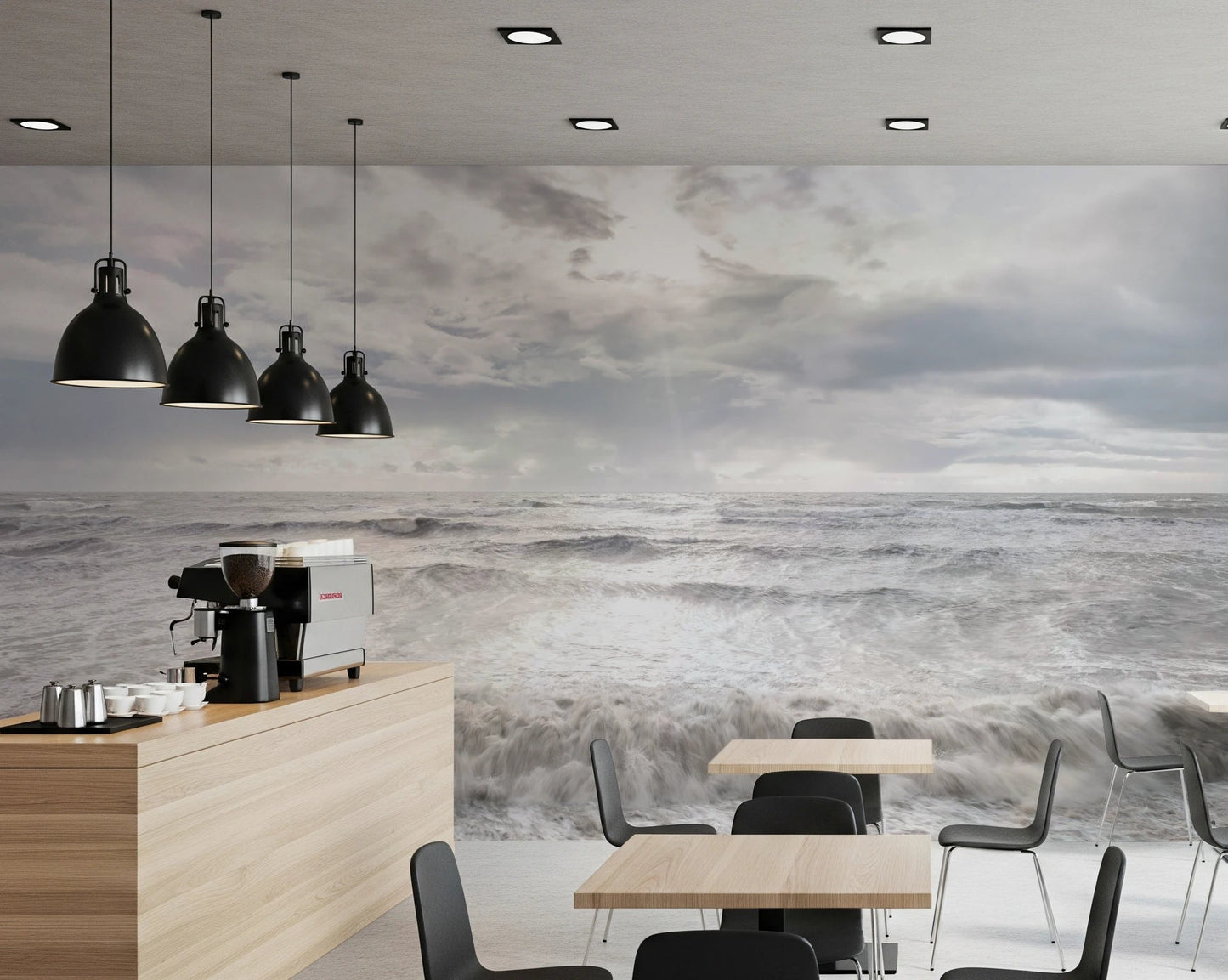 Café area features Rough Stormy Sea Wall Mural with cloudy ocean view