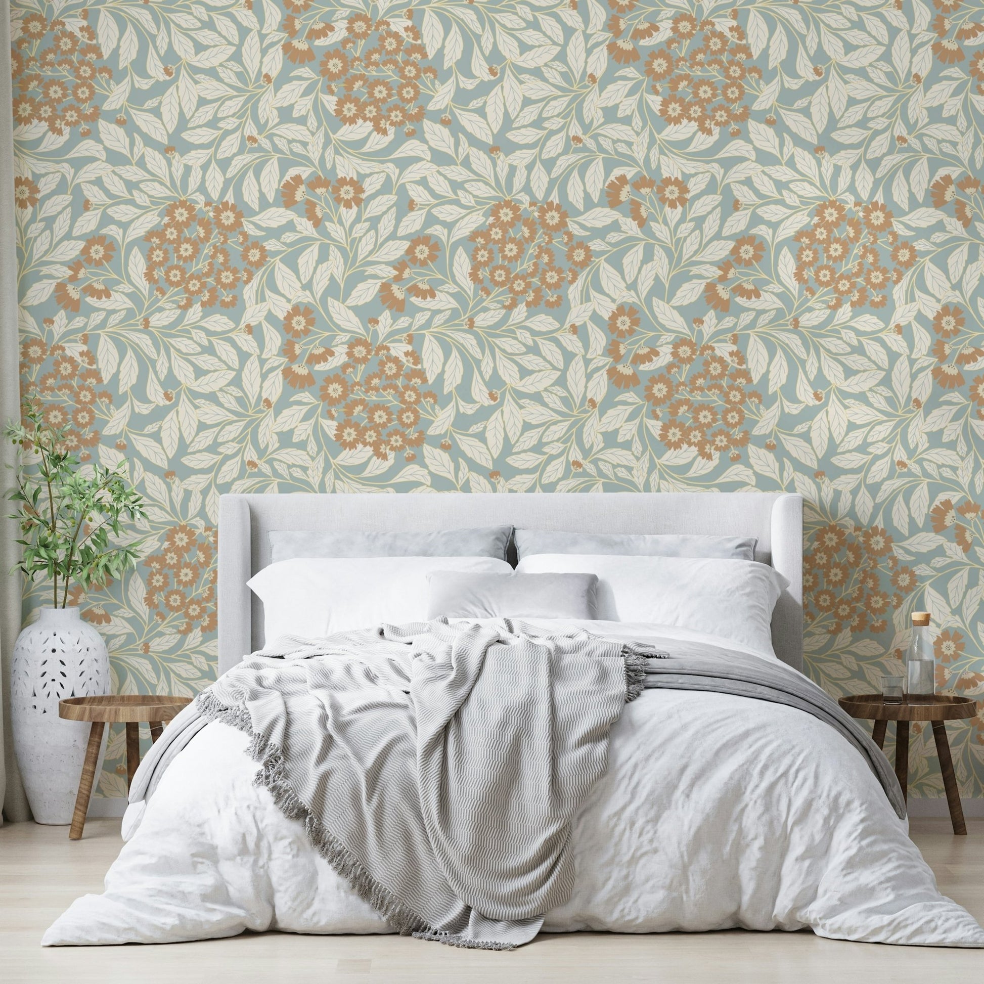The image shows a repeating pattern of rustic flowers and leaves.

