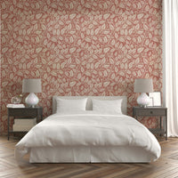 Red wallpaper with botanical leaf pattern

