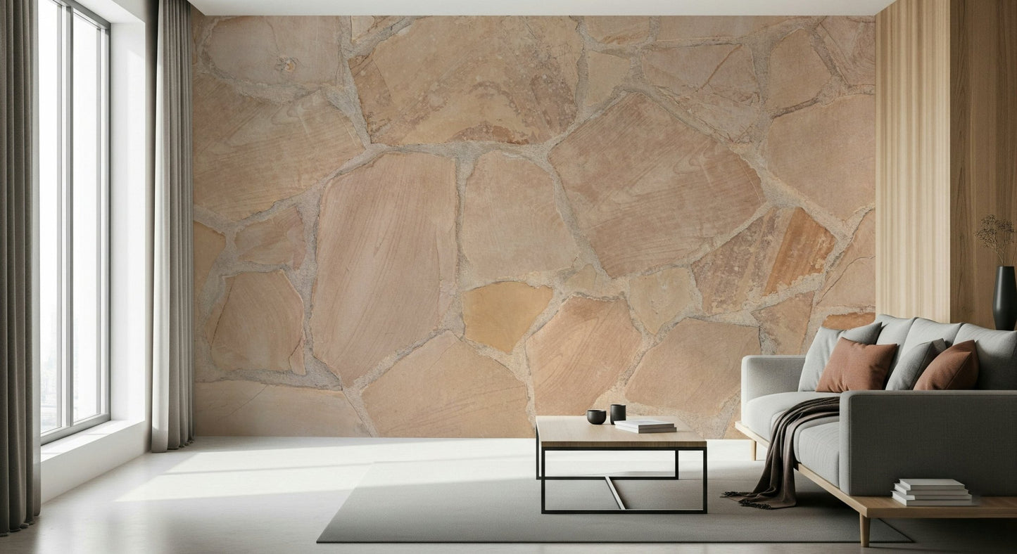 Textured stone wall mural behind wooden dining table.