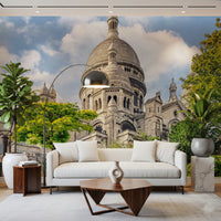 Sacred Heart Majesty wall mural showing historic landmark and green trees