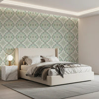 Minimal bedroom framed by Sage Bloom Tile Wallpaper with vintage tile detailing