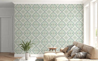 Soft lounge corner finished with Sage Bloom Tile Wallpaper and gentle sage tones