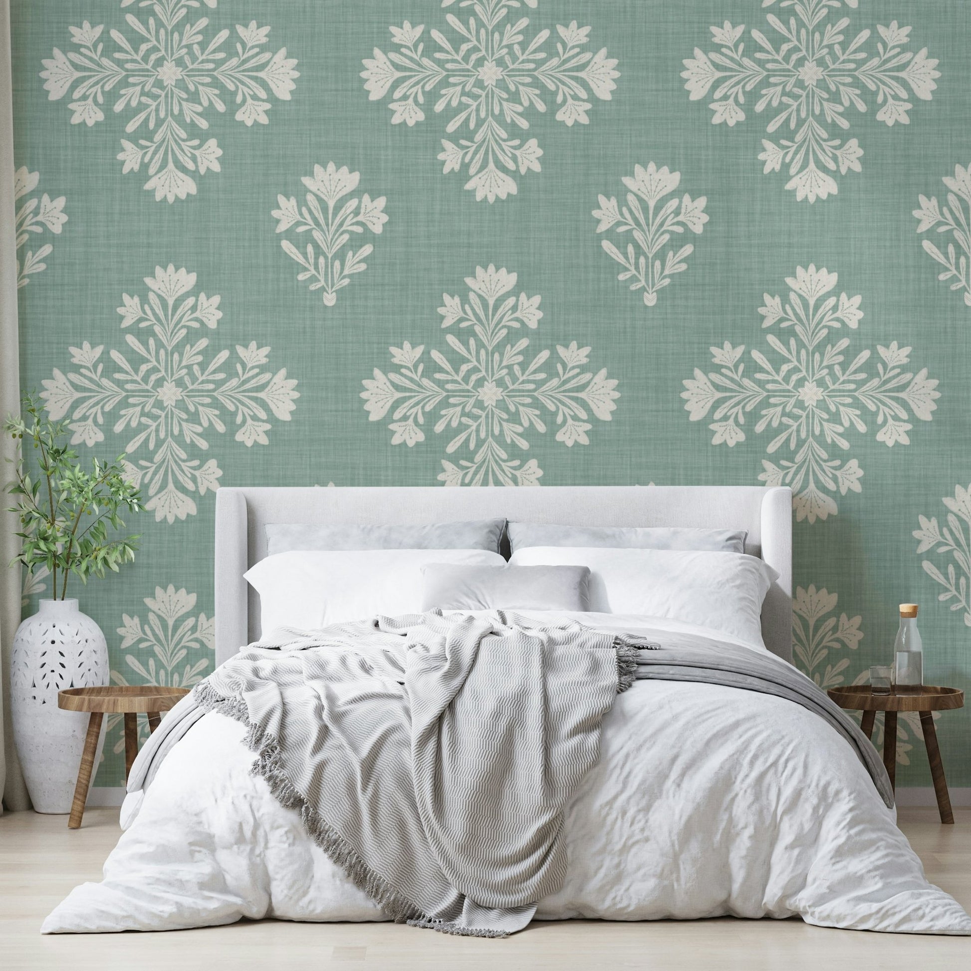 Bedroom decorated with botanical wallpaper

