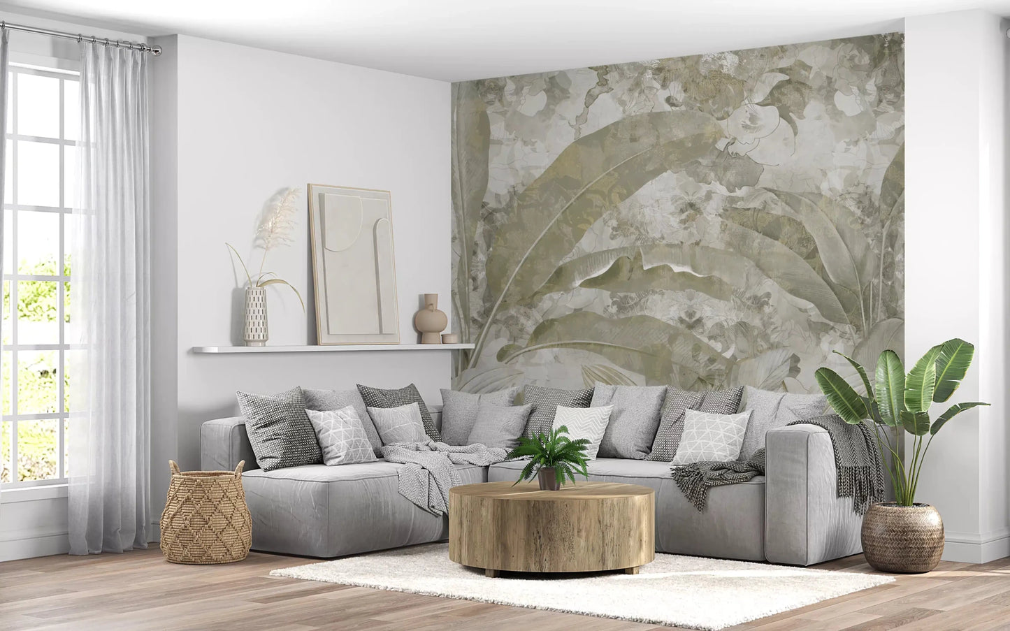 Living room wall with Sage Green Tropical Leaves wall mural in soft botanical tones